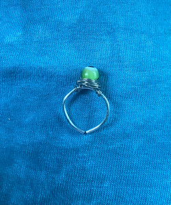 16g green evil eye nose ring